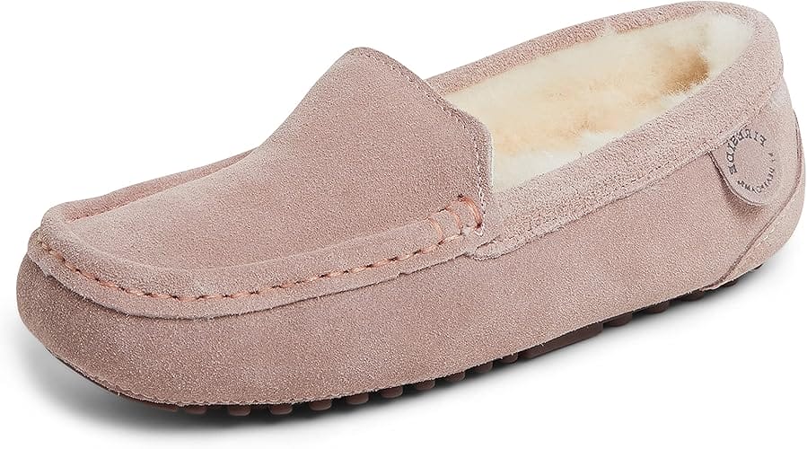 Product image of a women's moccasin slipper with a soft, faux-fur interior and suede exterior.