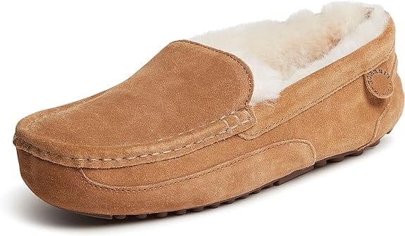 Product image of a men's moccasin slipper with a soft, faux-fur interior and suede exterior.